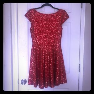 Little red sequins dress with low back.